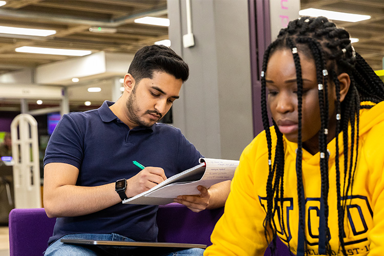 Man and woman studying